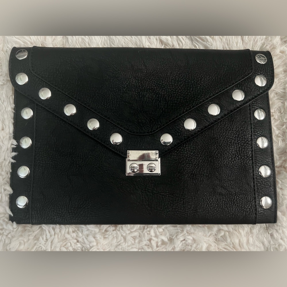NWOT- BCBGeneration black leather clutch-